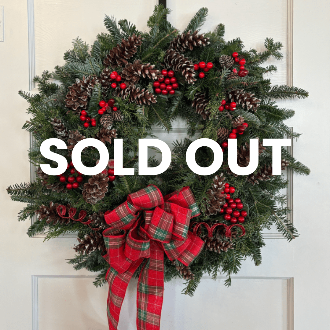 Festive wreath with pinecones, red berries, and a plaid bow hangs on door. "SOLD OUT" text overlays image, indicating unavailability.